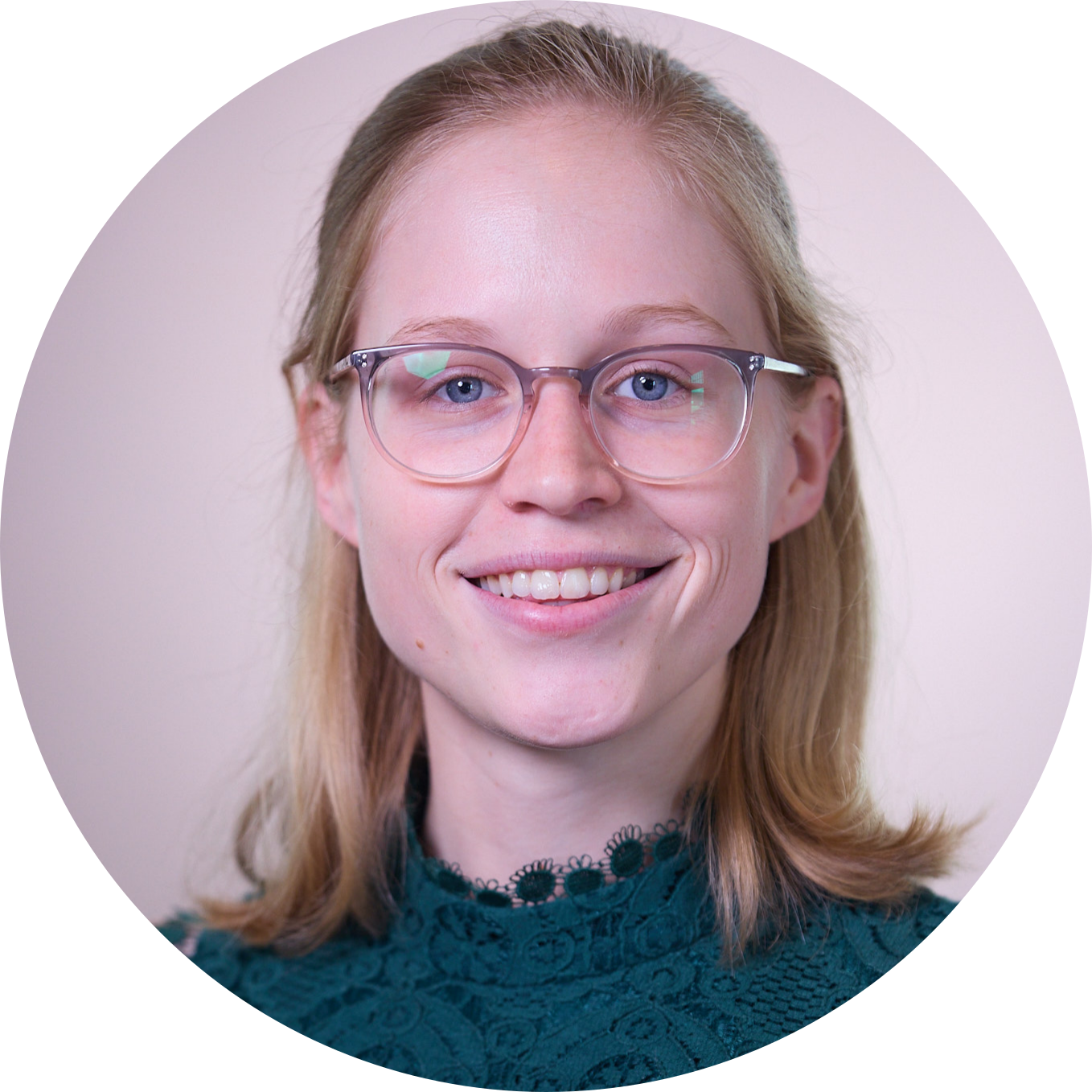 A photo of my face. I am wearing a green dress!